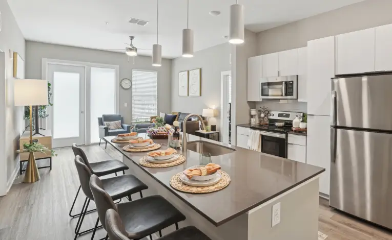 a modern kitchen with stainless steel appliances