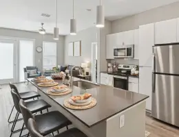 a modern kitchen with stainless steel appliances